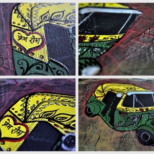 May include: A hand-painted artwork depicting a green and yellow auto rickshaw with intricate details. The rickshaw has a black windshield and a heart-shaped design with the text "Prem Ranga" in Hindi.