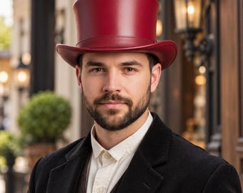May include: A deep red top hat with a smooth, structured finish and a matching band around the base. The hat features a tall, cylindrical crown and a curved brim, providing a classic silhouette that sits atop the head.