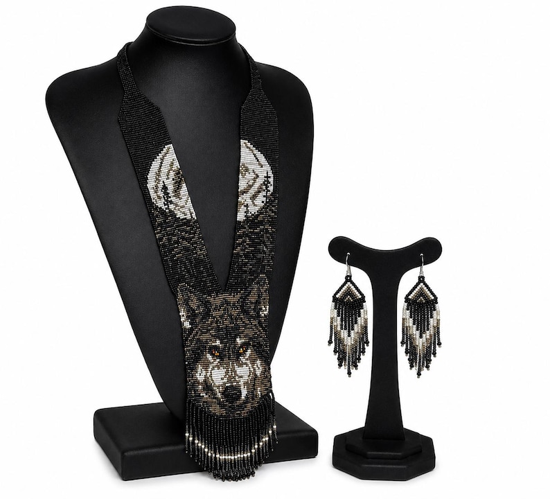 Complete handmade wolf beaded jewelry set featuring a wolf necklace and matching fringe earrings displayed on a clean white background.