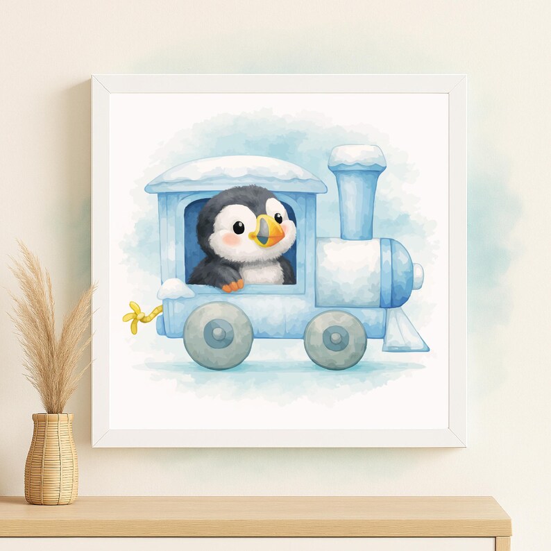 K&ouml;nnte beinhalten: Ein gerahmter Aquarelldruck mit einem entz&uuml;ckenden Pinguin in einem hellblauen Zug. Der Pinguin hat schwarz-wei&szlig;e Federn und einen orangefarbenen Schnabel. Der Zug hat ein verschneites Dach und R&auml;der, vor einem weichen blauen Hintergrund.