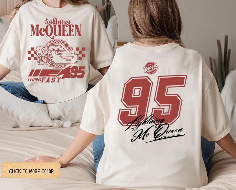 May include: Cream-colored t-shirt featuring Lightning McQueen graphics. The front displays the character's image with text, while the back showcases a large "95" and the character's name. A fun, casual tee.