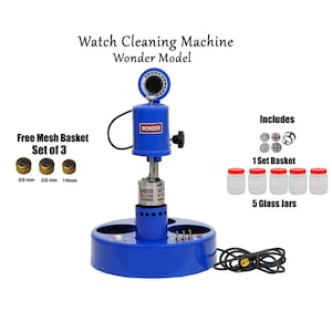 May include: A blue watch cleaning machine with the text "Watch Cleaning Machine Wonder Model". Includes a set of 3 mesh baskets, 5 glass jars, and a set of baskets. The machine has a blue base and a black power cord.