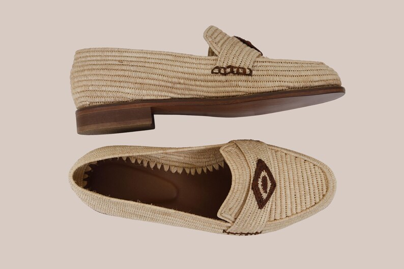 Eco-friendly raffia men’s moccasins on neutral background, artisan Moroccan slip-on loafers