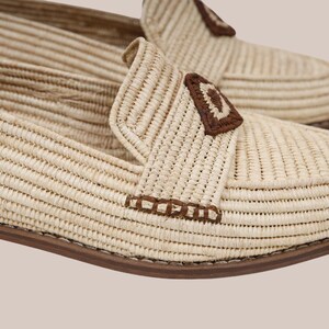 Close-up of raffia weaving detail on men’s moccasins, breathable summer artisan footwear
