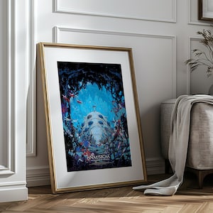 May include: Framed art print featuring a vibrant illustration with a blue and teal color scheme. The artwork depicts a futuristic structure surrounded by flora and fauna, with the word "NAUSICA&Auml;" at the bottom. The frame is gold-colored, and the print is leaning against a wall.