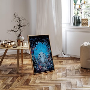 May include: A framed art print featuring a vibrant underwater scene with a large, detailed structure and the text "Nausicaa". The artwork is set against a dark, cave-like background with colorful elements. The frame is a light wood color.