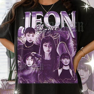 May include: Black t-shirt featuring a purple graphic of a group of women with the text "JEON So-nee" in a stylized font. The design has a vintage, distressed look.