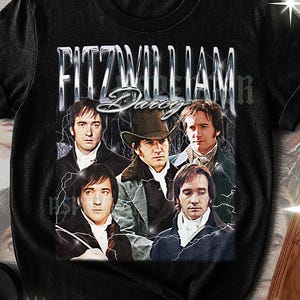 May include: Black unisex t-shirt featuring a vintage-style graphic of several men with the text "FITZWILLIAM Darcy". The design includes a distressed effect and lightning bolt accents, creating a retro aesthetic.