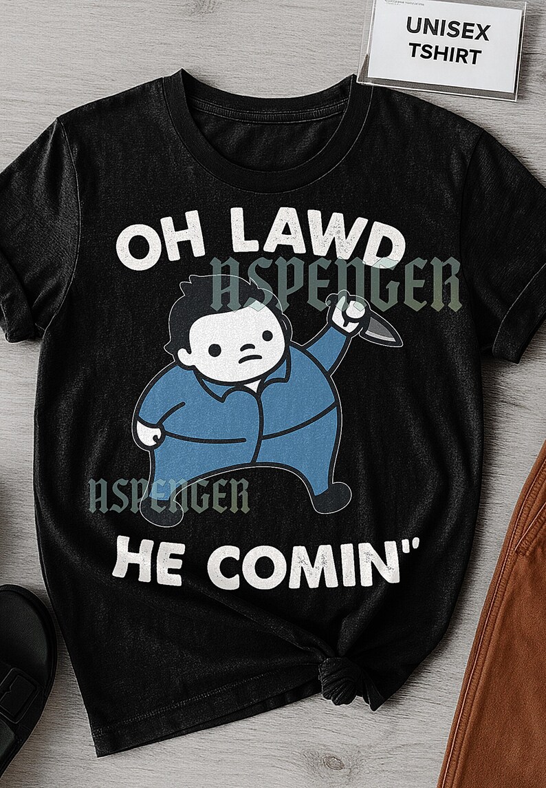 Koszulka „Oh Lawd He Comin’”, zabawna koszulka z grafiką Michaela Myersa z parodią chibi, koszulka na Halloween, prezent dla fana horrorów, straszna koszulka jesienna zdjęcie 1