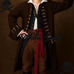 May include: A brown pirate coat with gold buttons and a long, flowing design. The coat is paired with a navy vest, white shirt, brown pants, and a red sash. A brown leather belt and black boots complete the look.