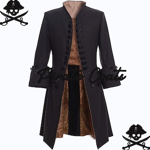 May include: A dark gray pirate coat with a high collar and button details. The coat has long sleeves with decorative cuffs and a flared skirt. The interior lining is a contrasting tan color. A pirate skull and crossbones logo is in the upper left and lower right corners.