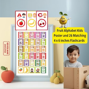May include: A framed educational poster and flashcards set for kids. The poster features the alphabet with fruit illustrations. The set includes 26 matching flashcards, each 4 x 6 inches. A child is seen in the image.