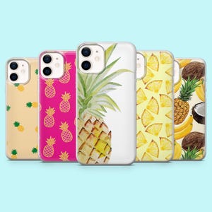 May include: A collection of phone cases with tropical fruit designs. The cases feature pineapples, pineapple slices, coconuts, and bananas in various patterns and watercolor illustrations. The color palette includes yellow, pink, green, and brown.