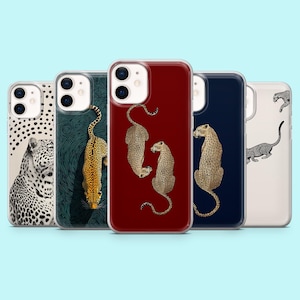 May include: A collection of five phone cases with unique designs. The cases feature illustrations of leopards in various poses and patterns. The backgrounds are in shades of white, dark teal, burgundy, navy blue, and cream. The leopard illustrations are in shades of brown and black.