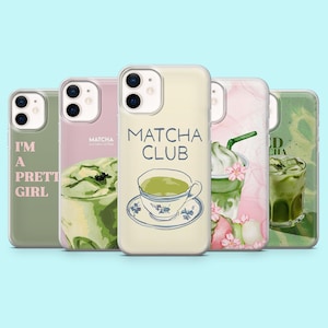 May include: A collection of phone cases with matcha-themed designs. The cases feature illustrations of matcha drinks, a teacup, and the text "Matcha Club" and "I'm a Pretty Girl". The cases are in shades of green, pink, and beige.