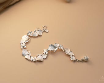 Handgemaakte 999 fijne zilveren vlinderbloesemarmband • Natuursieraden