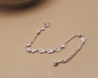 Gebloemde schakelarmband · Handgemaakt 999 fijnzilver · Minimalistische, op de natuur geïnspireerde sieraden | Druppel zilver