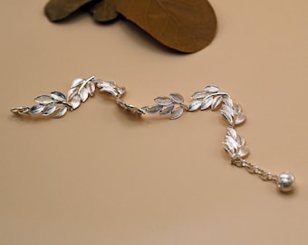 Armband met filigraanblad · Handgemaakt 999 fijnzilver · Verstelbare krans · Druppel zilver