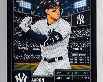 May include: A Tecmo New York Yankees baseball card featuring Aaron Judge in a pinstripe uniform holding a bat. The card displays a 1/1 serial number, player statistics, the Yankee Stadium scoreboard, and the text All Rise. All Power. All Judge.