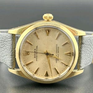 Rolex Vintage Rolex 34mm Watch Oyster Perpetual Ref f1014 Gold Capped Case