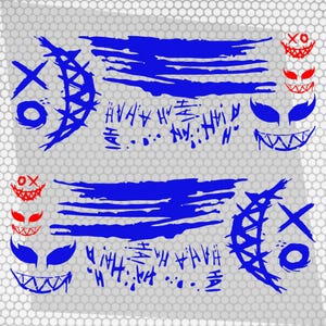 May include: A decal sheet featuring blue brushstroke patterns, text reading HAHA, and stylized graphic elements including blue and red grinning faces with sharp teeth, crescent moon shapes with X and O markings, and pointed eye designs.