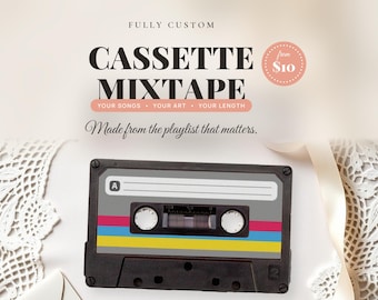 May include: A black cassette tape with a grey label featuring a white A, and horizontal pink, blue, and yellow stripes. Text reads: FULLY CUSTOM CASSETTE MIXTAPE YOUR SONGS YOUR ART YOUR LENGTH Made from the playlist that matters.