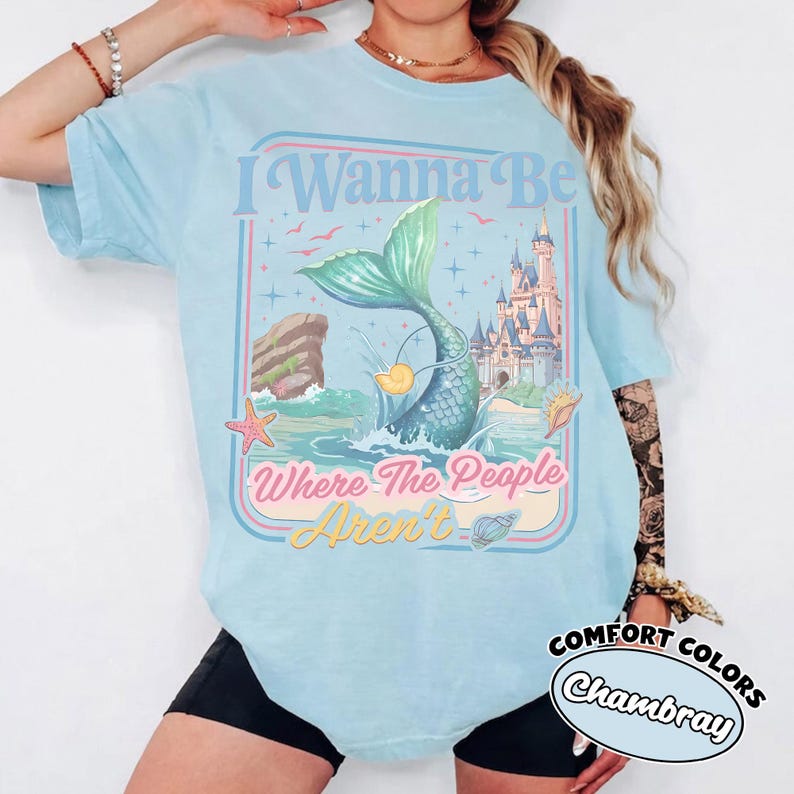 May include: A white ceramic mug with a black handle and the text "But First, Coffee" in a black, bold font. The mug is sitting on a wooden surface. The mug is approximately 4 inches tall.