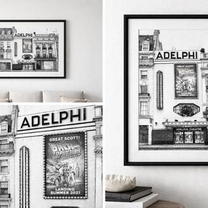 May include: Black and white framed print of the Adelphi Theatre. The image shows the theater's facade with the name "ADELPHI" prominently displayed. A poster for "Back to the Future" is visible. The print is displayed on a white wall.