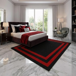 May include: A rectangular area rug featuring a solid black center bordered by two distinct red stripes. The rug is positioned on a white marble floor with grey veining, situated in a bedroom with a dark brown bed frame and red bedding accents.