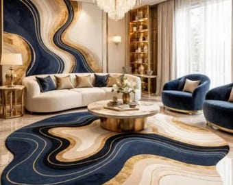May include: A living room featuring a large, irregular, circular area rug with flowing navy blue, cream, and gold wave patterns. The room includes a curved white sofa, two navy blue armchairs, a round coffee table, and a crystal chandelier.