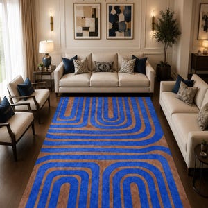 May include: A rectangular area rug featuring a repeating pattern of bold, vibrant blue concentric arch shapes set against a solid, muted brown background. The design consists of symmetrical, curved lines that create a rhythmic, geometric visual effect.