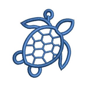 May include: A blue embroidered sea turtle design. The turtle features a detailed, openwork shell with a honeycomb pattern. The design includes a loop at the top, suggesting it could be used as a pendant or charm. The embroidery is on a white background.