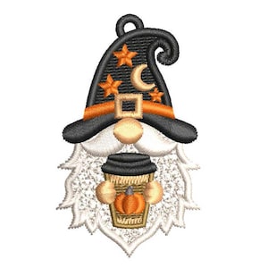 May include: An embroidered patch featuring a gnome wearing a black wizard hat decorated with orange stars and a crescent moon. The gnome has a white beard, a tan nose, and is holding a tan coffee cup with a black lid and an orange pumpkin design.