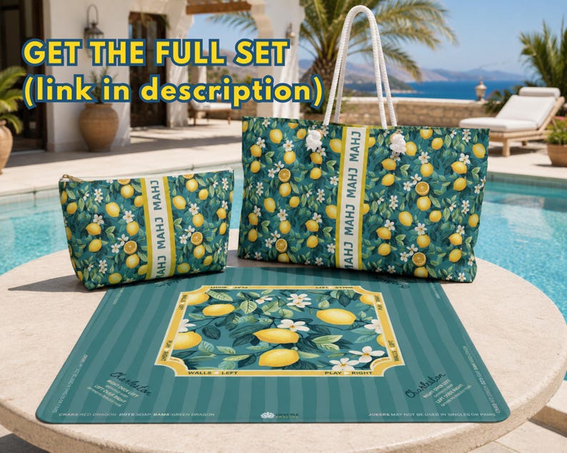May include: A matching set featuring a large tote bag with white rope handles, a zippered pouch, and a rectangular game mat. All items display a dark green pattern of yellow lemons and white blossoms, with text reading MAHJ and Charleston.