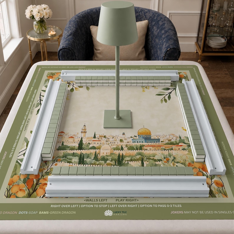 May include: A green and white tile game set with a scenic background of a city. The set includes green tiles, white rails, and a green lamp. The game board has text that reads "Walls Left" and "Play Right".