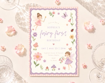 May include: A rectangular birthday invitation card with a light pink gingham border and purple scalloped edge. The text reads: Join us for a SOPHIA'S fairy first BIRTHDAY SAT | AUG 23 | 2PM. Illustrations include two fairies, flowers, mushrooms, a butterfly, and a ladybug.
