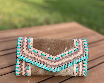 Clutch de piel de vacuno con puntada azul