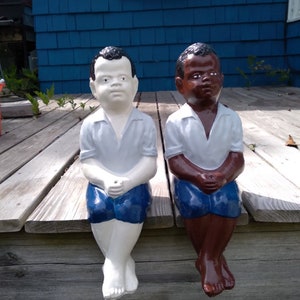 Great Pick Fishing Boy Jr. ..New Model. Excellent Pro painted. Dk. Blue Shorts. AFR.AMER...White  Shirt Statue. Grey Shirt on the White Boy.