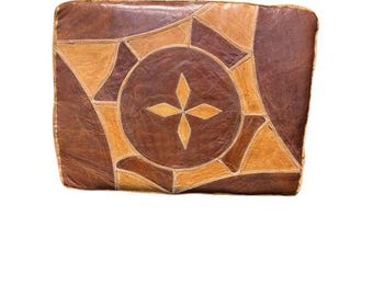 Handcrafted Hausa Leather Pouf Ottoman originating from Nigeria, designed for functional home décor