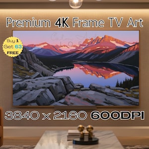 May include: A large, rectangular 4K Frame TV displays a landscape painting of a mountain range reflected in a lake. The artwork features shades of red, orange, and blue. Text on the screen reads "Calm Art". The TV is framed in a light wood.