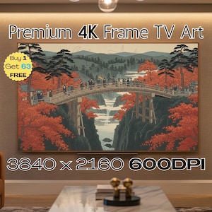 May include: A framed 4K TV art piece displays a Japanese-style landscape. The artwork features a bridge over a gorge, with people crossing it. The scene is filled with red and orange foliage, with the text "Premium 4K Frame TV Art" at the top.
