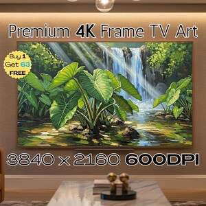 May include: A framed 4K TV art piece featuring a vibrant landscape with a waterfall and lush green plants. The artwork displays the text "Premium 4K Frame TV Art", "Buy 1 Get 63 FREE", and "3840 x 2160 600DPI".