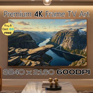 Könnte beinhalten: Ein großer, rechteckiger 4K-Rahmen-TV zeigt eine malerische Landschaft mit Bergen und einem Fluss. Das Bild enthält den Text "Premium 4K Frame TV Art", "Calm Art LOFT" und "3840 x 2160 600DPI". Ein "Buy 1 Get 63 FREE" Aufkleber ist in der Ecke.