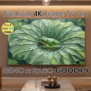 Può includere: Opera d'arte 4K per TV incorniciata con una rana verde su una foglia di ninfea strutturata con goccioline d'acqua. L'opera d'arte ha uno sfondo verde tenue. Il testo "Premium 4K Frame TV Art" è visualizzato in alto.