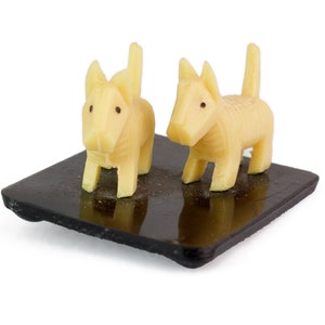 Vintage  Scotties 2 Plastic Celluloid Dogs on Platform Made in Japan 1.5 inches wide