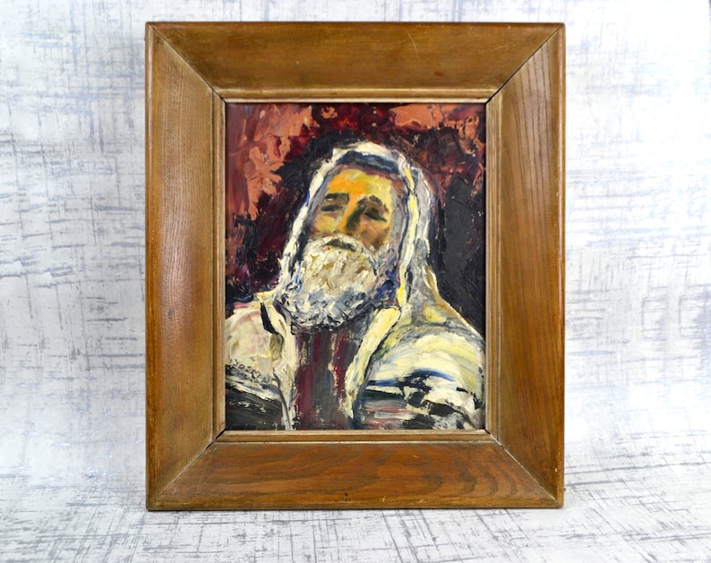 May include: A framed oil painting of a man with a white beard and a white robe. The painting is done in a loose, expressive style with a warm color palette.