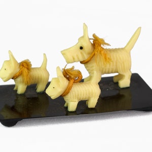Vintage Small Scotties 3 Plastic Dogs on Platform Made in Japan with Ribbons