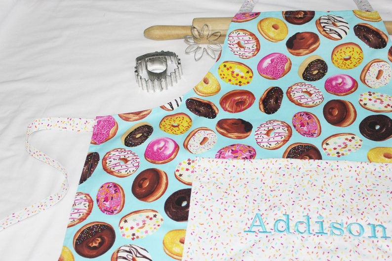 Personalized and Ruffled Donuts on Turquoise Adult Apron with white sprinkles pocket and ruffle made to order