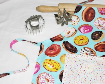 Child Apron - Donuts on Blue with white sprinkles pocket - ready to ship