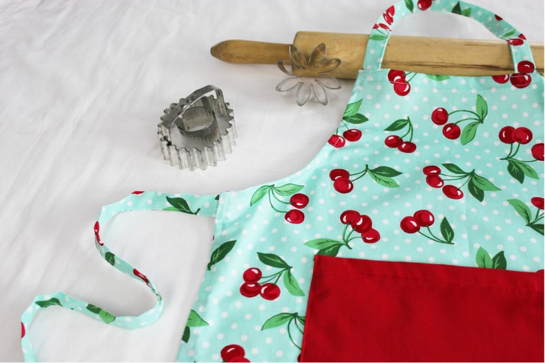 ready to ship Retro Cherries on Aqua Child Apron with red pocket
